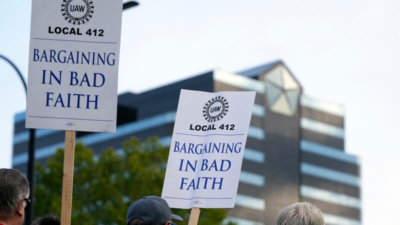 United Auto Workers march outside the Stellantis North American Headquarters, Wednesday, Sept....