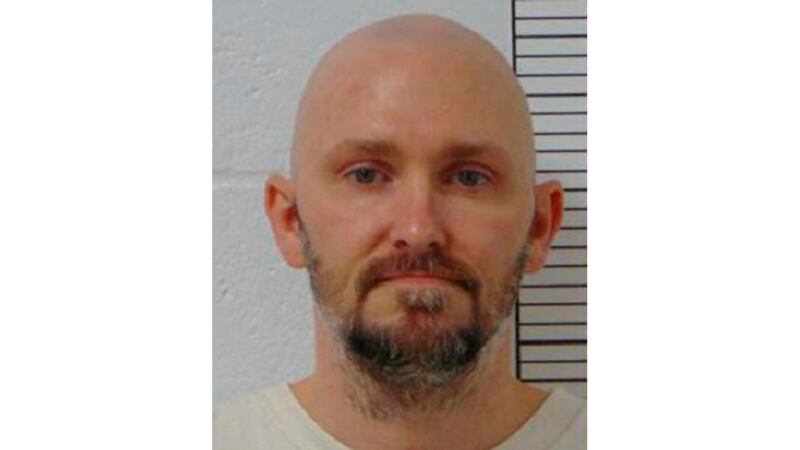This booking photo provided by the Missouri Department of Corrections shows Michael Tisius....