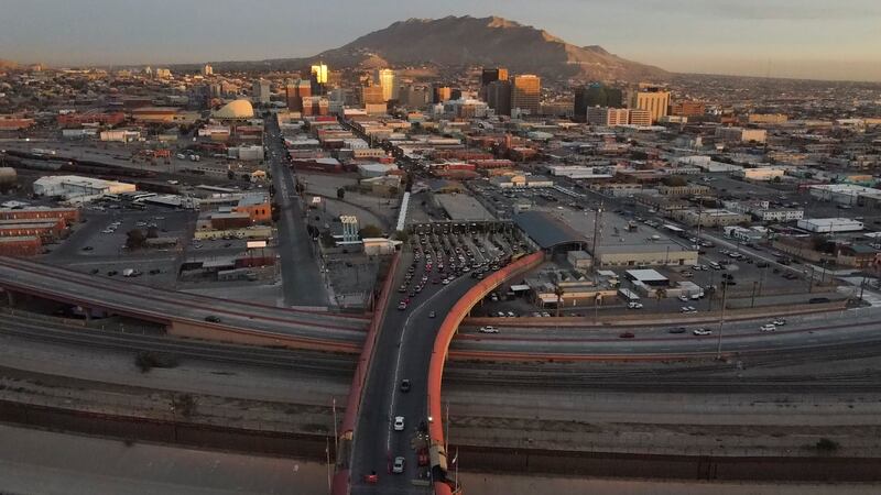 FILE - Cars line up at the Paso del Norte international bridge in Ciudad Juarez, Mexico,...
