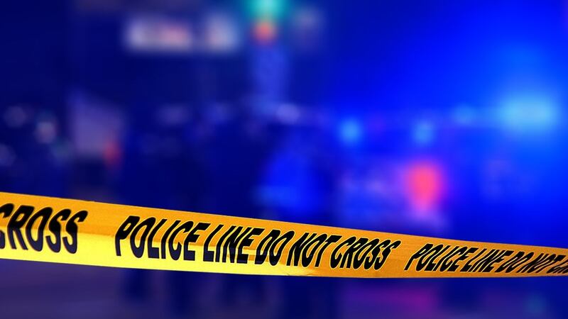 Police lights and caution tape.