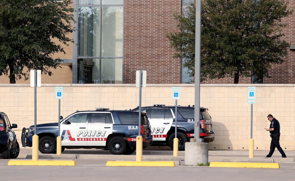 Arlington police investigate a shooting at Lamar High School in Arlington, Texas on Monday,...