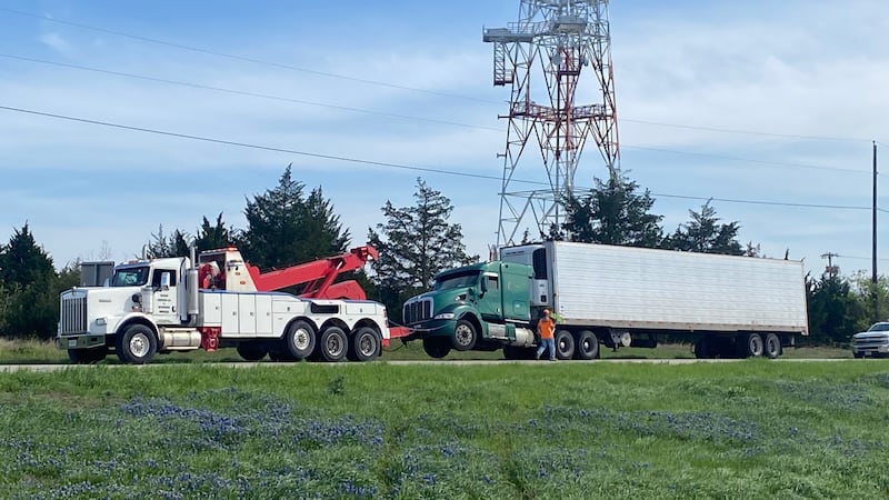Texas officials say a volunteer firefighter was killed by a tractor-trailer when he was...