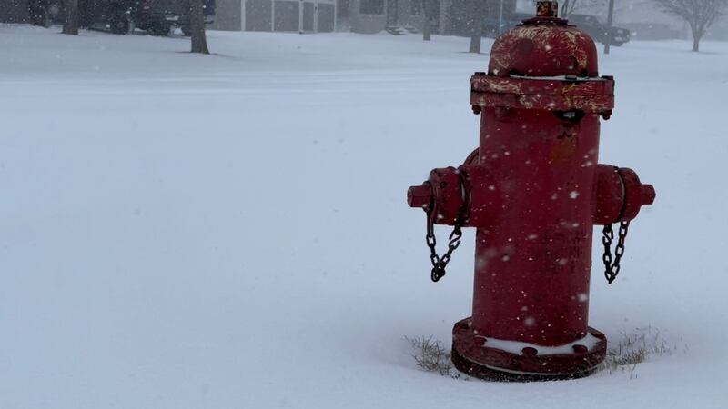 Clearing snow around fire hydrants